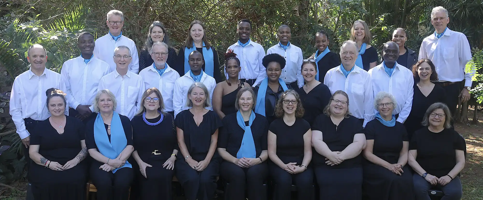 Durban Chamber Choir members gathered in a garden setting in Durban, KwaZulu-Natal